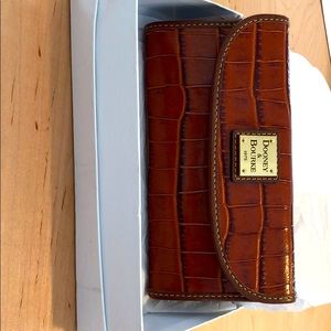 Original new Dooney and Bourke alligator wallet.